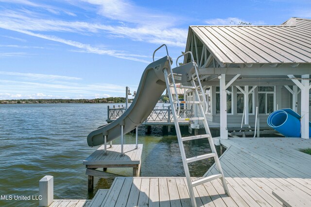 dock area with a water view