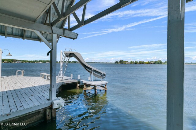 dock area featuring a water view