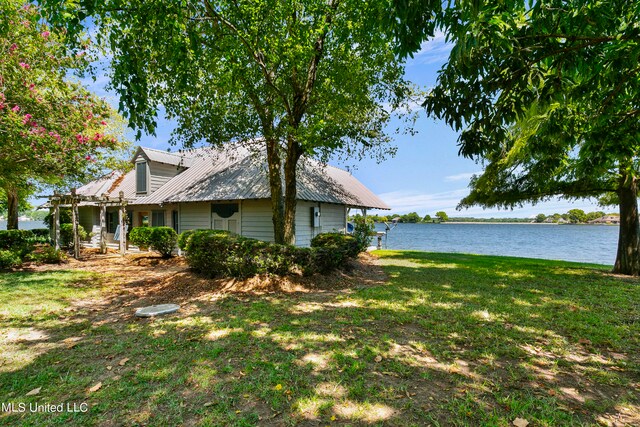 view of yard with a water view