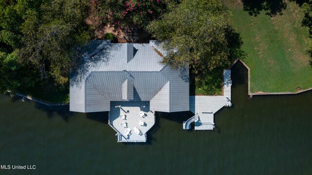 drone / aerial view with a water view