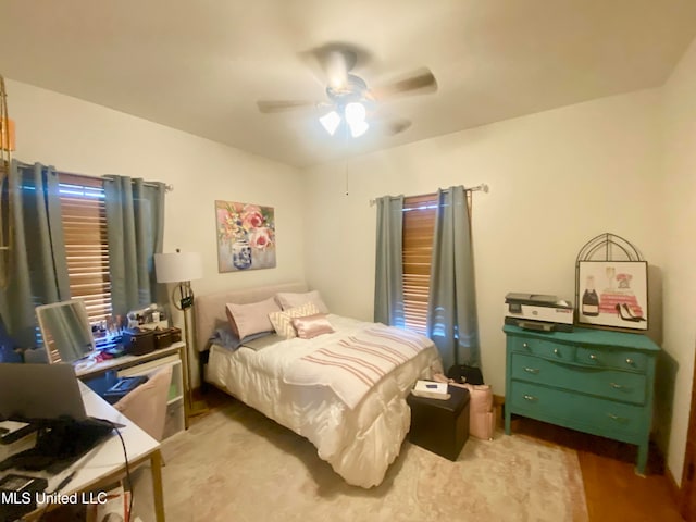 bedroom featuring ceiling fan