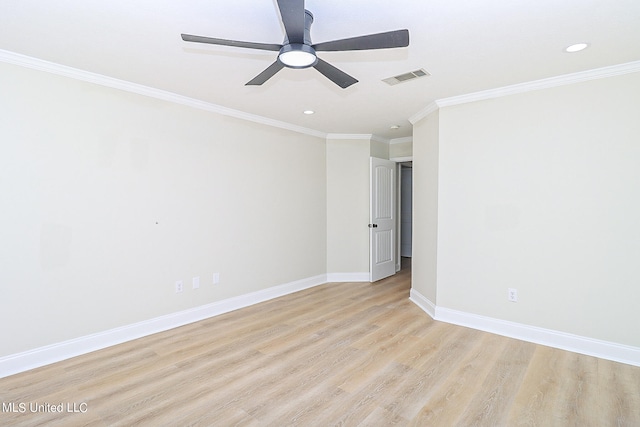 spare room featuring light hardwood / wood-style floors, crown molding, and ceiling fan