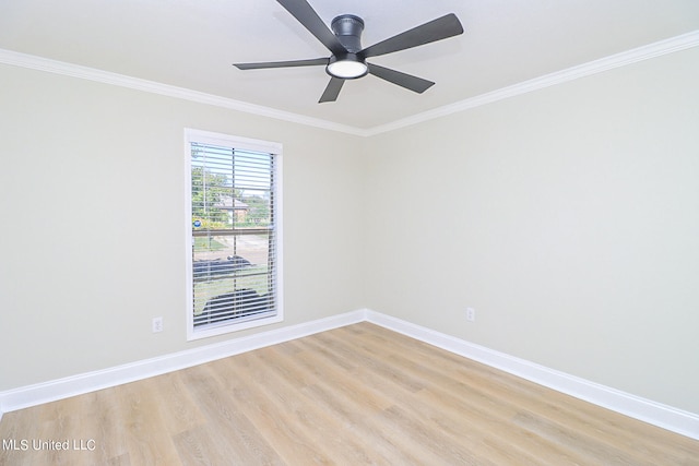 spare room with ornamental molding, light hardwood / wood-style floors, and ceiling fan