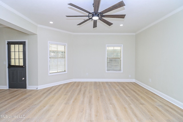 unfurnished room with ornamental molding, light hardwood / wood-style floors, and ceiling fan