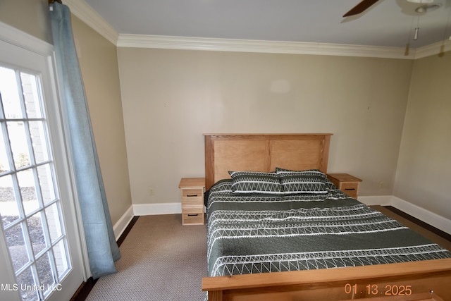 bedroom with ornamental molding and ceiling fan