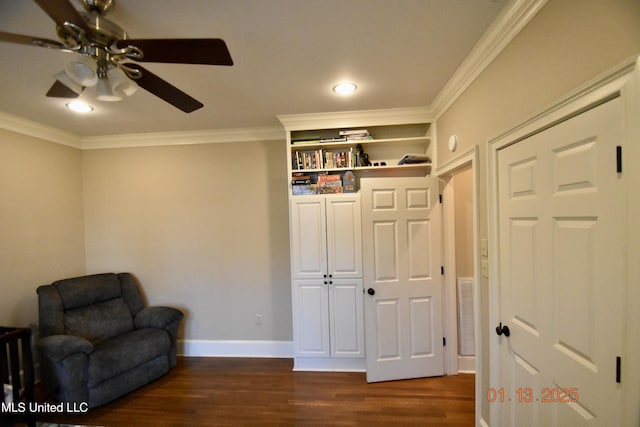 living area with ceiling fan, crown molding, and dark hardwood / wood-style floors