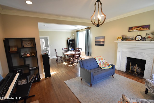 living room with ornamental molding, dark hardwood / wood-style flooring, and a fireplace