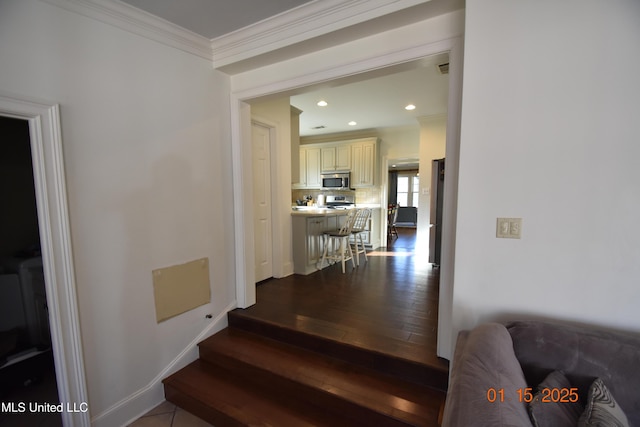 staircase with crown molding