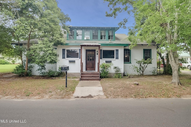 view of front of property featuring stucco siding