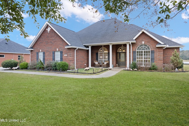 view of front of home with a front lawn