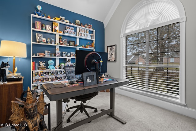 carpeted office space with ornamental molding