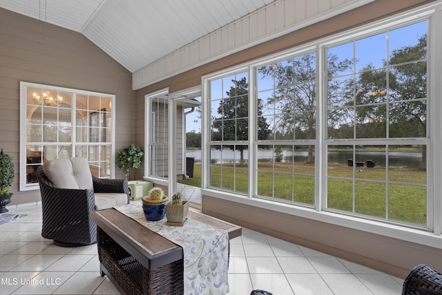 sunroom featuring lofted ceiling and a wealth of natural light