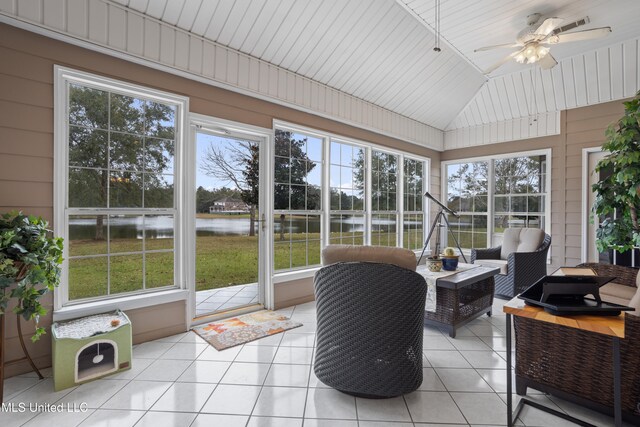 sunroom with a water view, ceiling fan, lofted ceiling, and wood ceiling