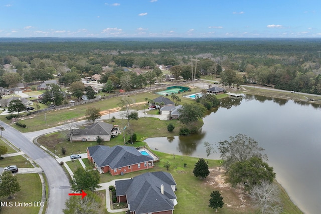 drone / aerial view with a water view