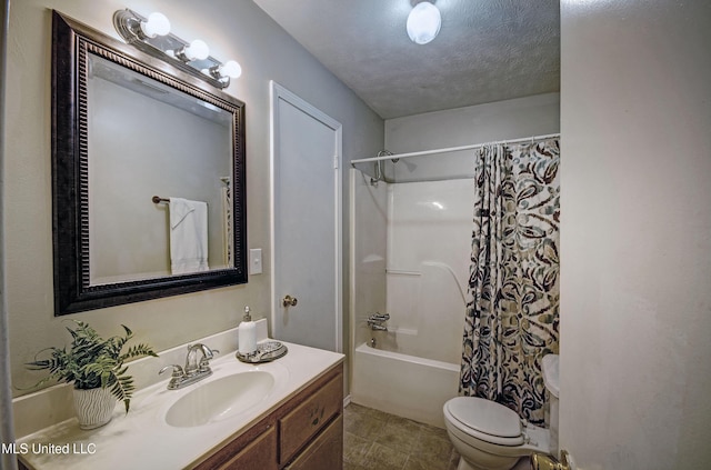 8962 Pleasant Hill Rd, Carthage, MS 39051 - full bathroom featuring vanity, toilet, tile patterned floors, shower / bath combo, and a textured ceiling