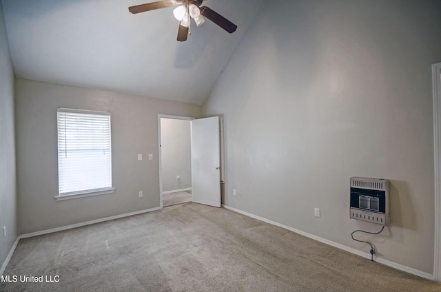 8962 Pleasant Hill Rd, Carthage, MS 39051 - spare room with heating unit, ceiling fan, carpet, baseboards, and high vaulted ceiling
