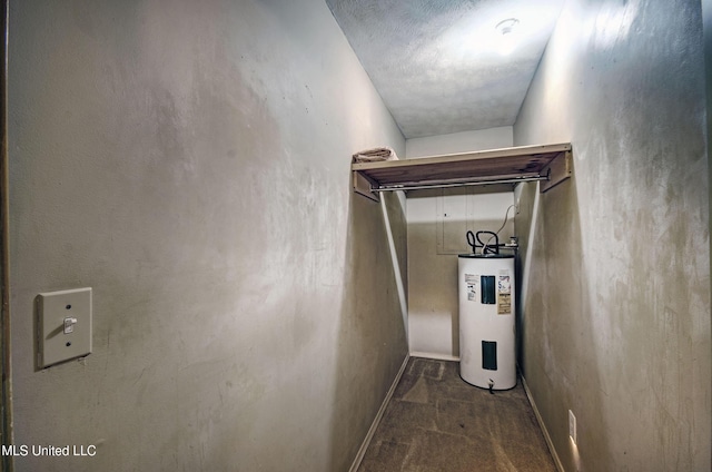 8962 Pleasant Hill Rd, Carthage, MS 39051 - hall with water heater, carpet floors, and baseboards