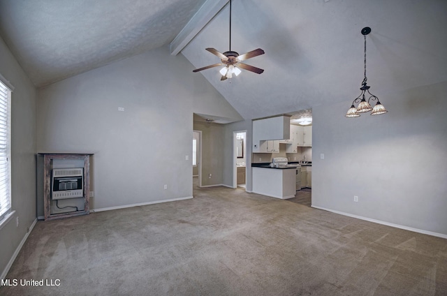8962 Pleasant Hill Rd, Carthage, MS 39051 - unfurnished living room with heating unit, beamed ceiling, ceiling fan, high vaulted ceiling, and carpet