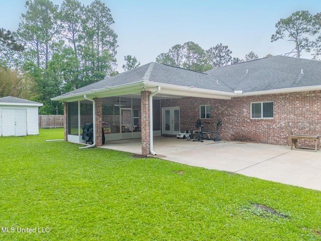 6811 Old Fort Bayou Rd, Ocean Springs, MS 39564 - back of house with french doors, a patio, a sunroom, and roof with shingles