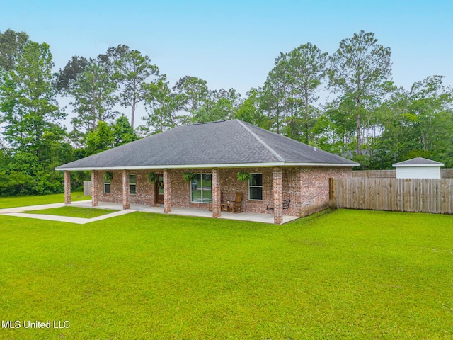 6811 Old Fort Bayou Rd, Ocean Springs, MS 39564 - view of front of home with a patio area and roof with shingles