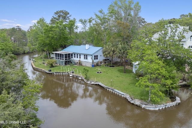 bird's eye view with a water view