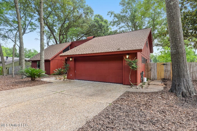 single story home featuring a garage