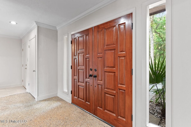 foyer entrance with ornamental molding