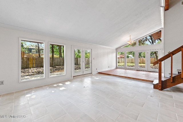 unfurnished living room featuring french doors, a healthy amount of sunlight, and light tile patterned floors