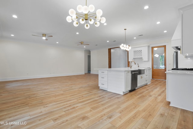 kitchen featuring light hardwood / wood-style flooring, white cabinetry, dishwasher, and pendant lighting