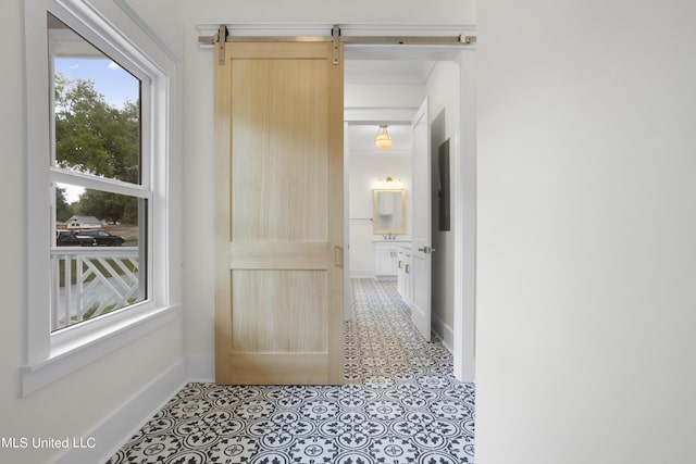corridor featuring baseboards