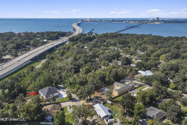 birds eye view of property featuring a water view and a residential view