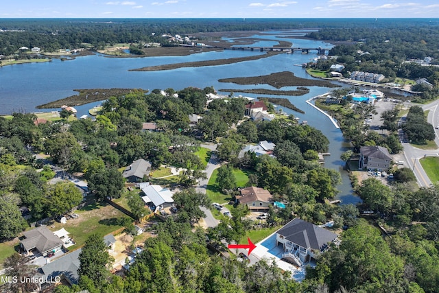 bird's eye view with a water view