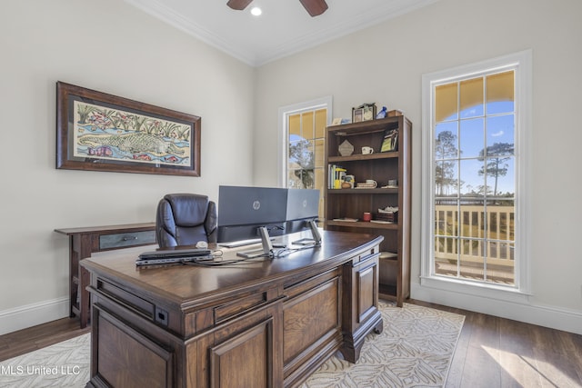 home office featuring crown molding, light wood-style floors, a ceiling fan, baseboards, and recessed lighting