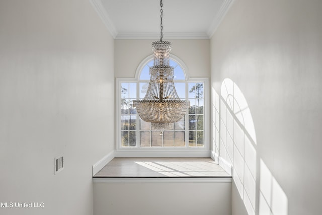 room details with visible vents, ornamental molding, and a notable chandelier