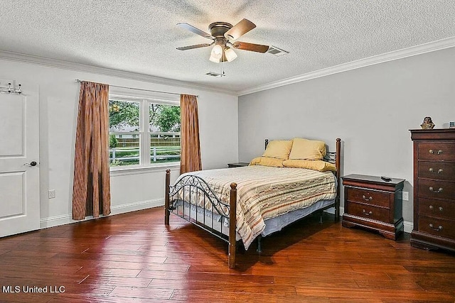 bedroom featuring ornamental molding, a textured ceiling, dark hardwood / wood-style floors, and ceiling fan