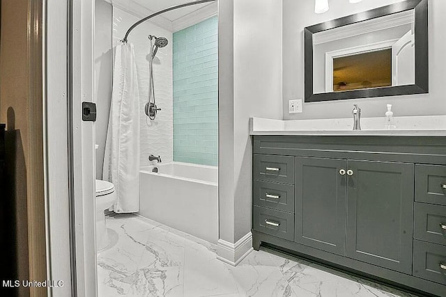 full bathroom featuring vanity, toilet, shower / bath combo with shower curtain, and ornamental molding