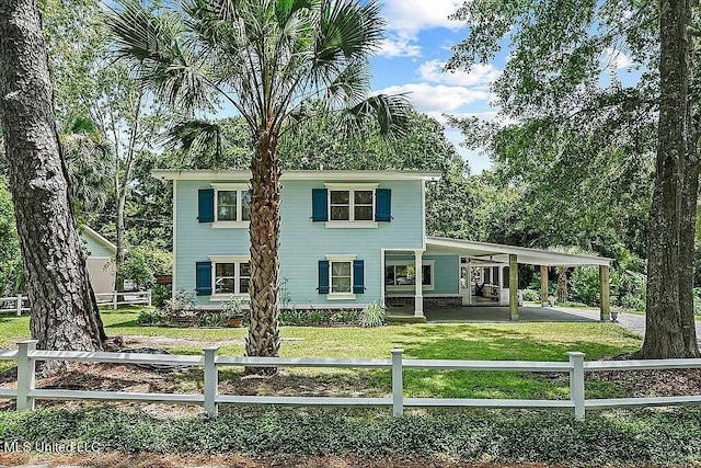 view of front of home with a front yard