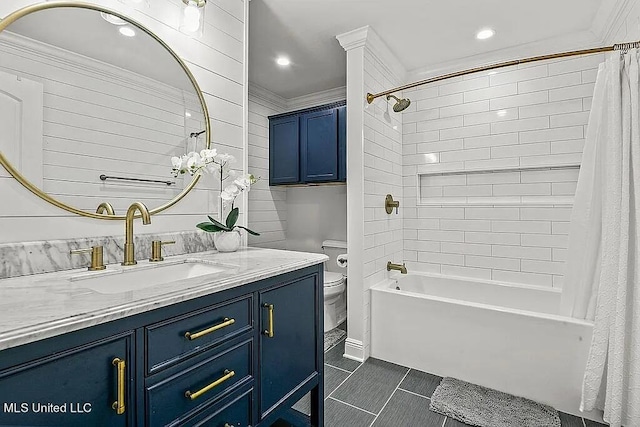 full bathroom with vanity, toilet, crown molding, and shower / tub combo with curtain