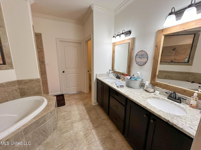 bathroom featuring crown molding, vanity, tiled bath, and toilet