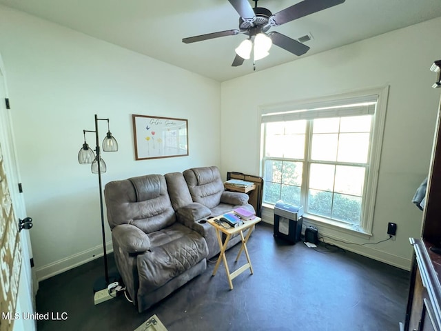 living room featuring ceiling fan