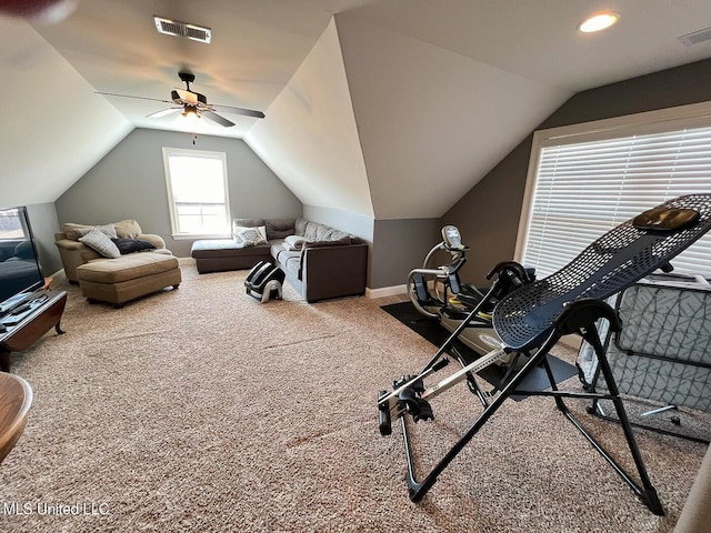 workout room featuring lofted ceiling, carpet floors, and ceiling fan