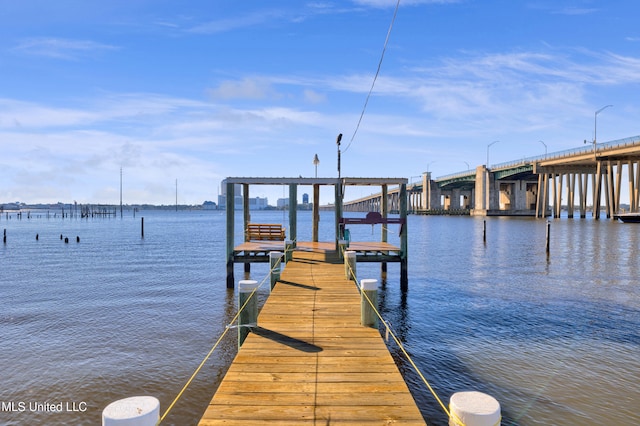 dock area featuring a water view