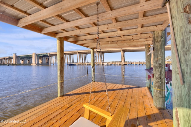 view of dock with a water view