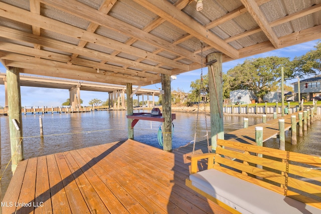 view of dock with a water view