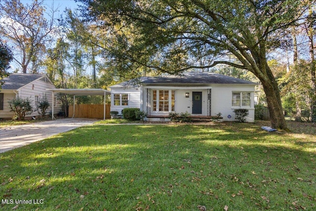 ranch-style house with a front lawn and a carport