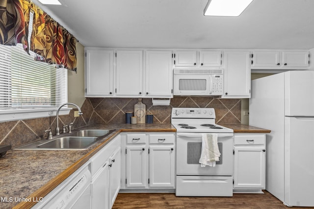 151 Lakebend Cir, Brandon, MS 39042 - kitchen with white appliances, white cabinets, backsplash, dark wood-type flooring, and dark countertops