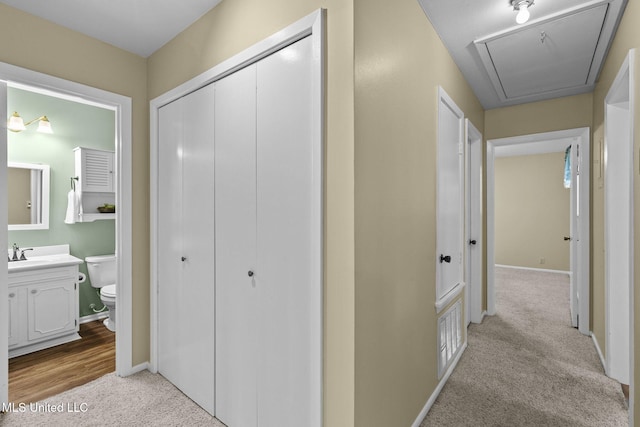 151 Lakebend Cir, Brandon, MS 39042 - hall with carpet floors and attic access