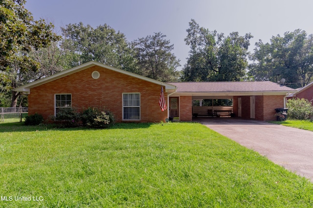 ranch-style home with a carport and a front lawn