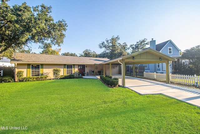 ranch-style house with a front yard and a garage