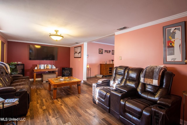 living room with ornamental molding and dark hardwood / wood-style flooring